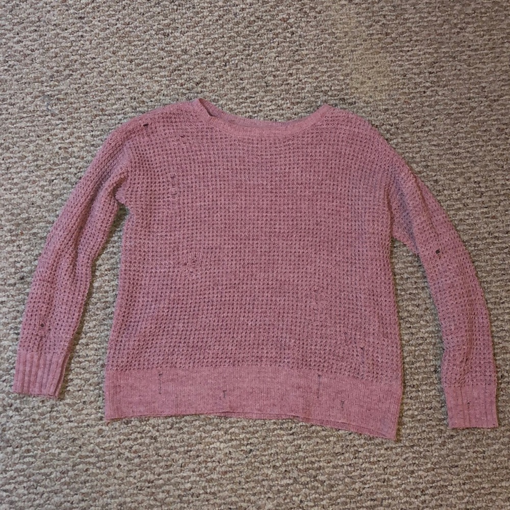 Very soft sweater with intentional holes